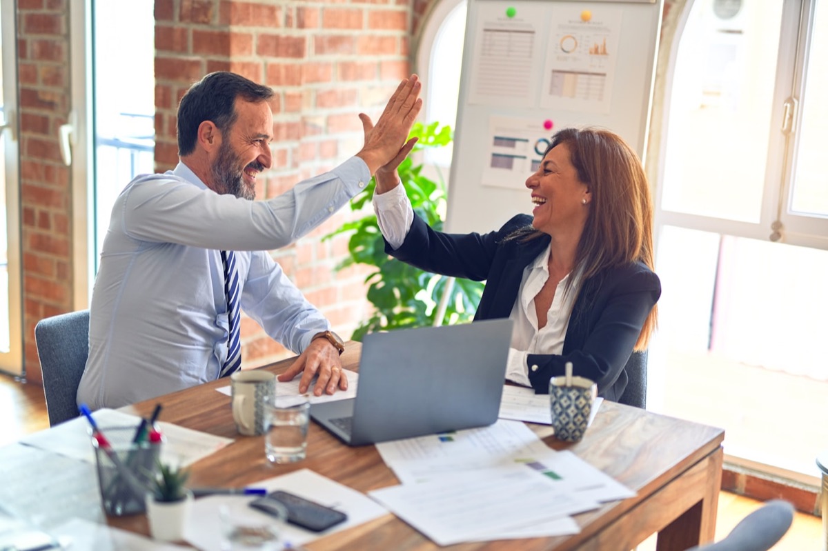 Professionals collaborating around a meeting table